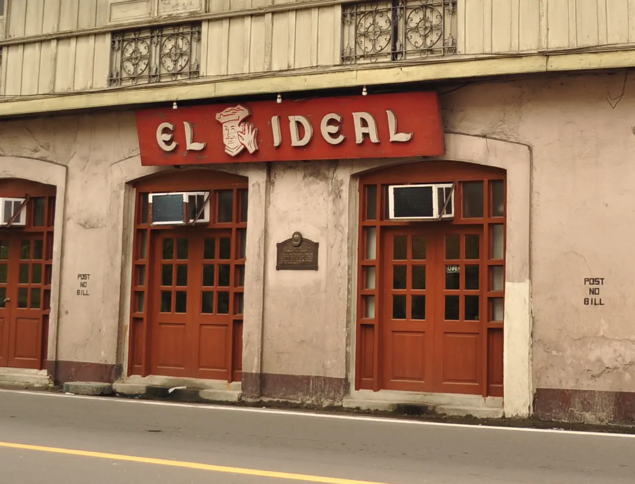 The Cesar Lacson Locsin house on Rizal Street in Silay, with the El Ideal bakery sign