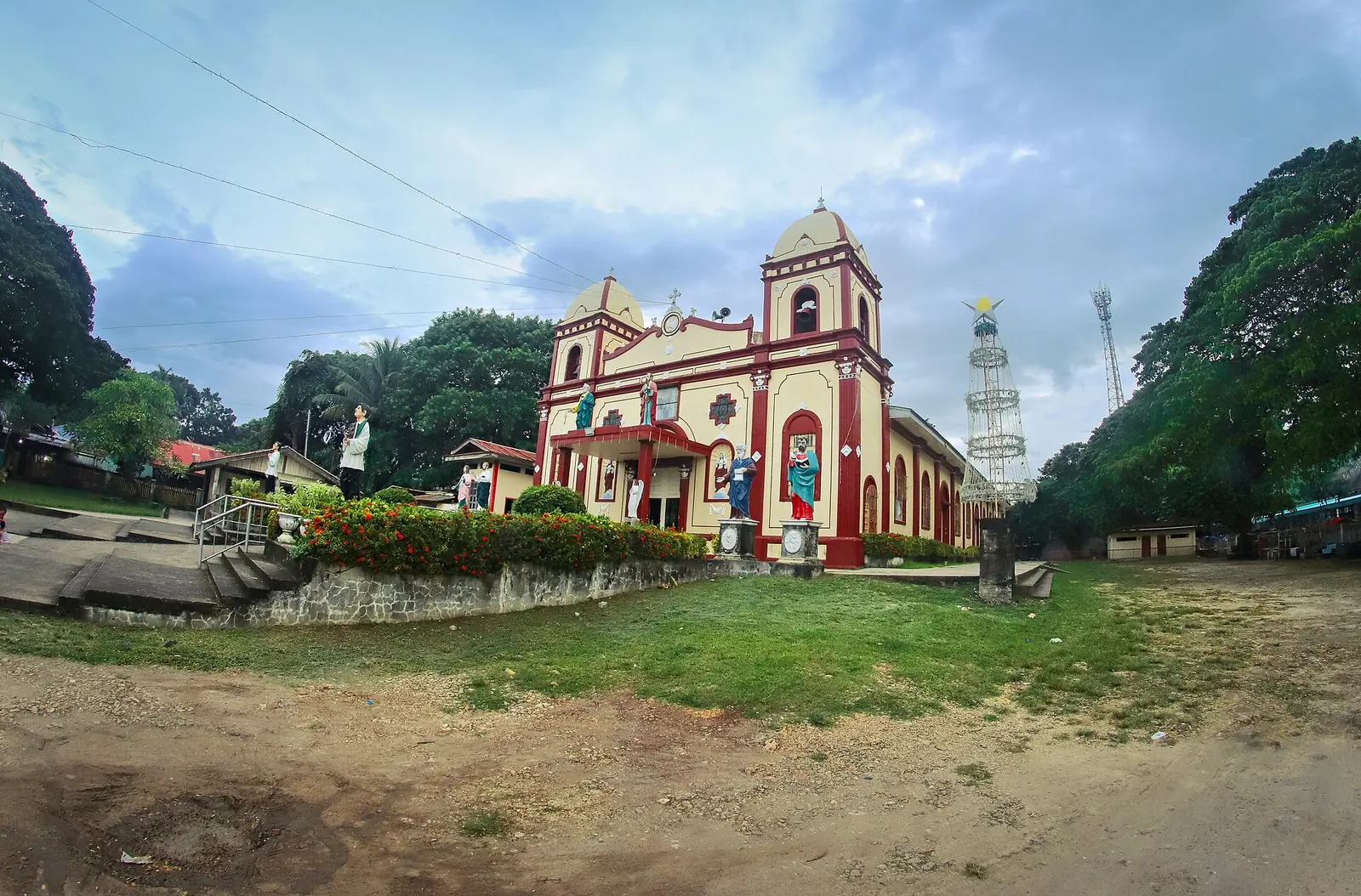 San Vicente Ferrer Parish-Shrine in Vito, Sagay, a church with a bell tower seen from the front